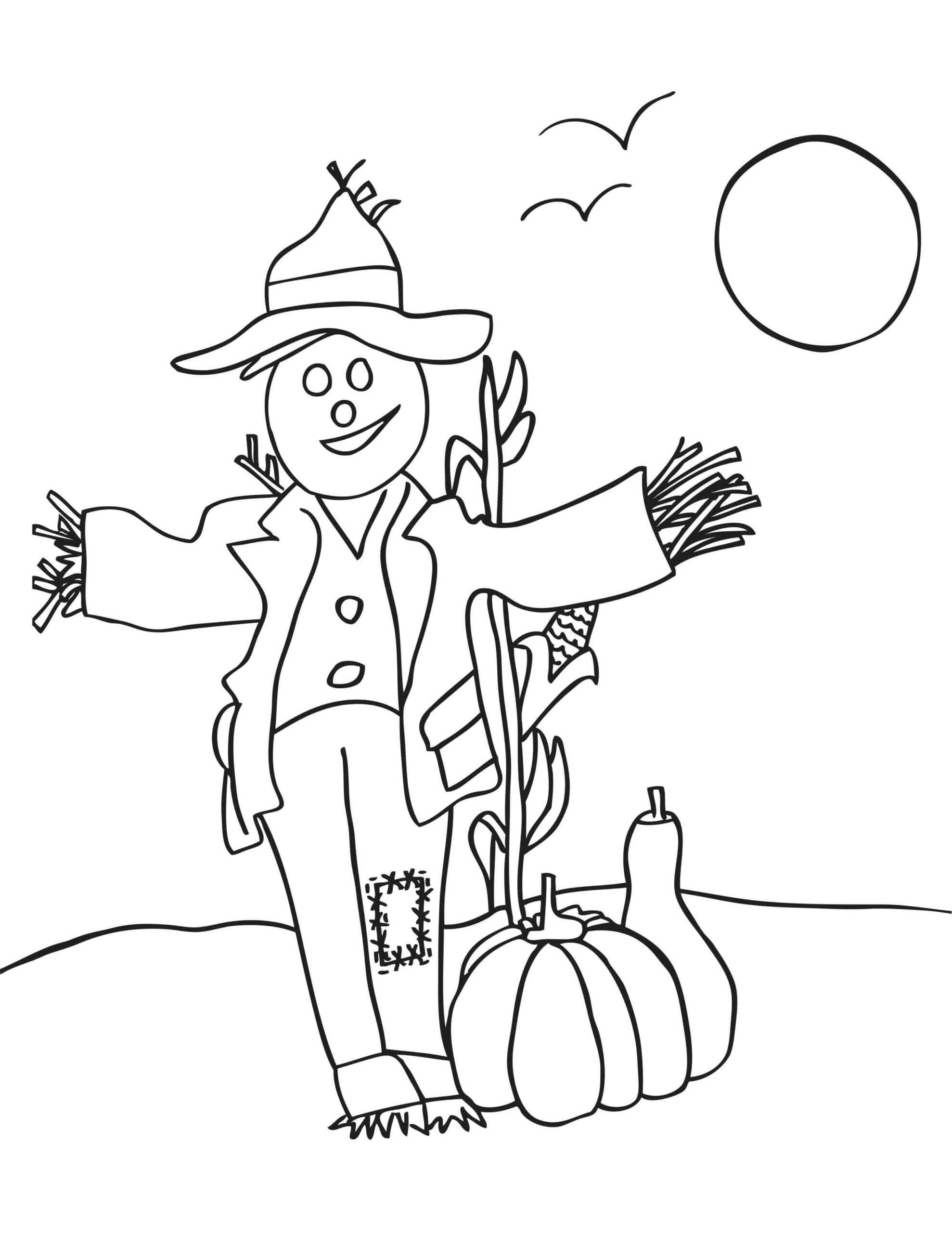 Espantapájaros y Calabaza en Otoño