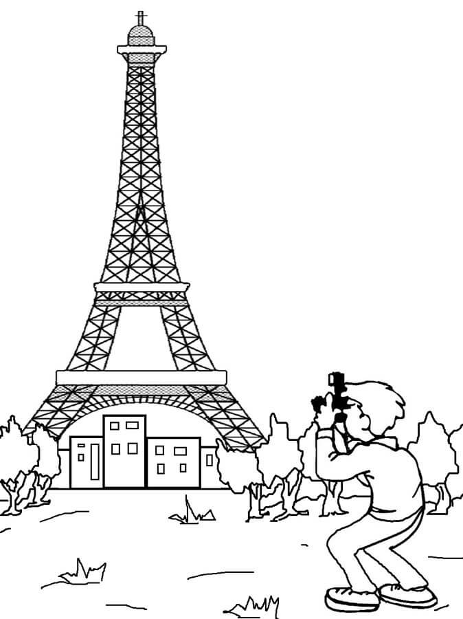 Fotógrafo Tomando Fotos de la Torre Eiffel
